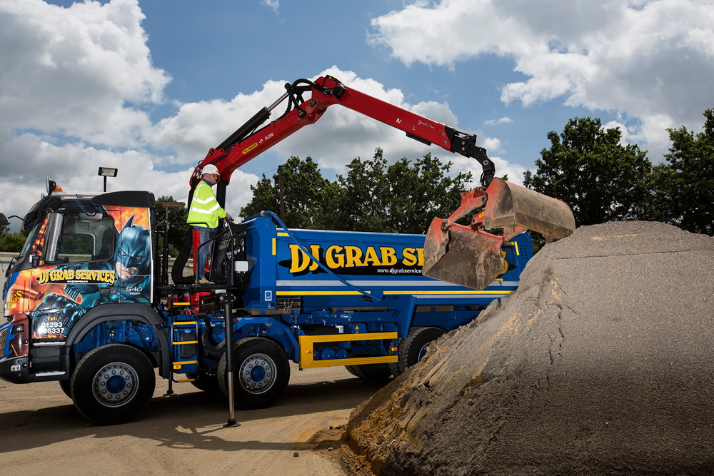 Grab hire lorry Batman in action