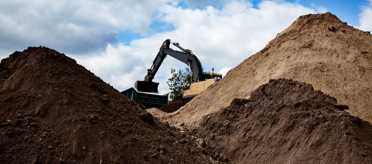 Topsoils, loams, barks and mulches supply and delivery in Surrey Sussex and London